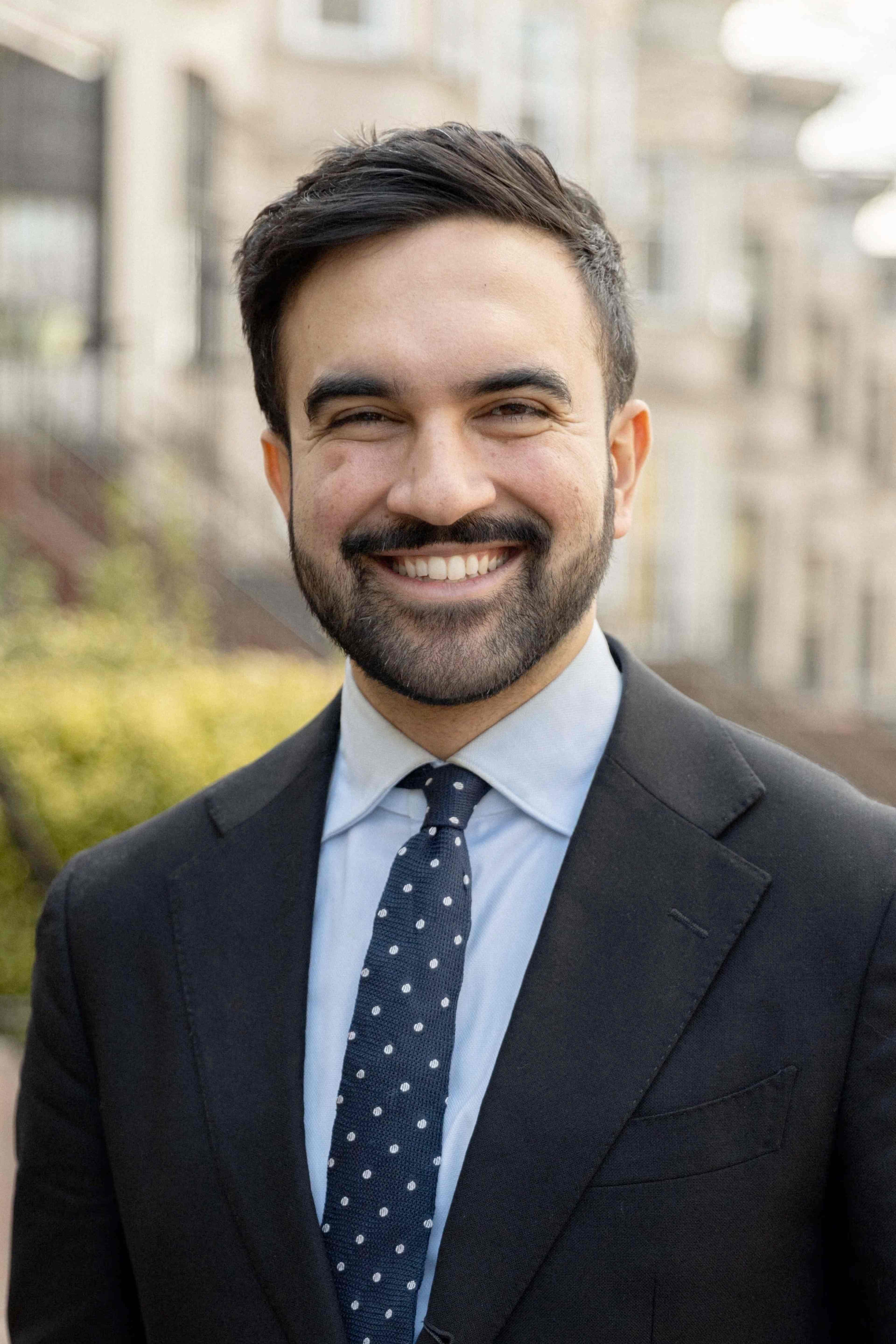 Zohran in business attire